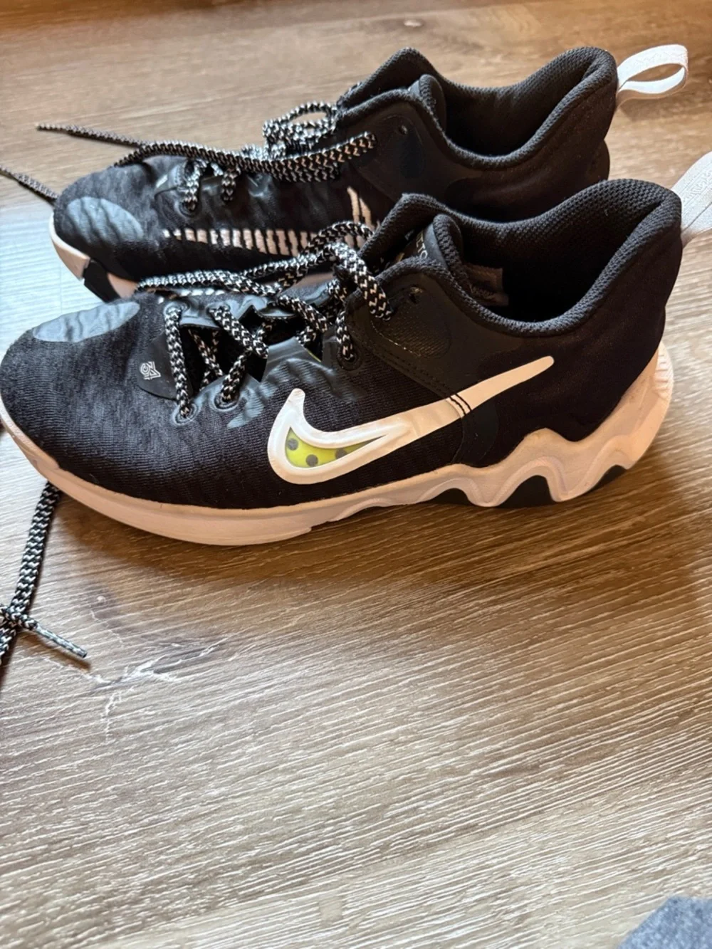 Nike Black and White Running Shoes with Lime Swoosh Accents